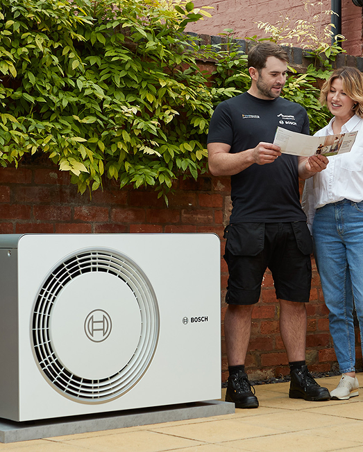 Bosch heat pump with heating engineer and homeowner