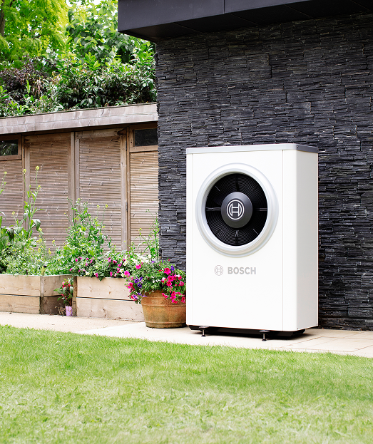 Bosch heat pump installed outside a modern home
